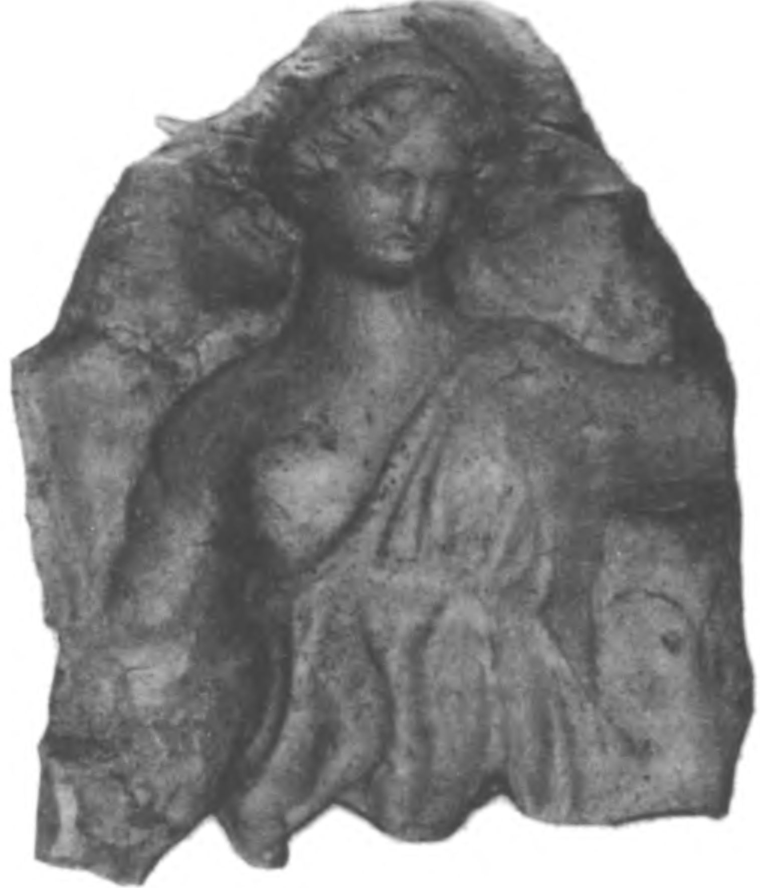 Рис. 12. Терракота с изображением богини. III—II вв. до н. э.